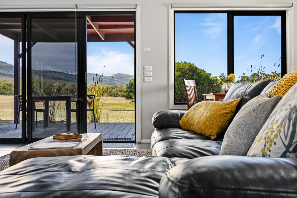 Lounge area with indoor fireplace, large TV, wifi and Grampians and wildlife views